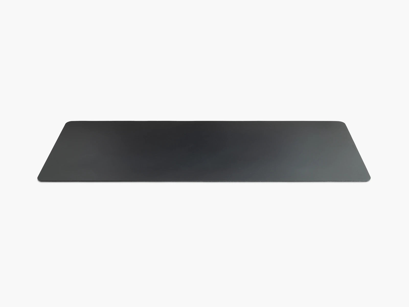 Large black leather desk pad on a white background.
