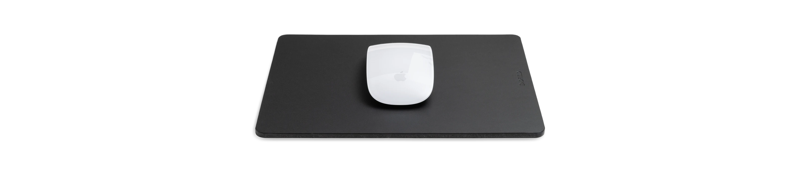 Black leather mouse pad with a white mouse on a white background.